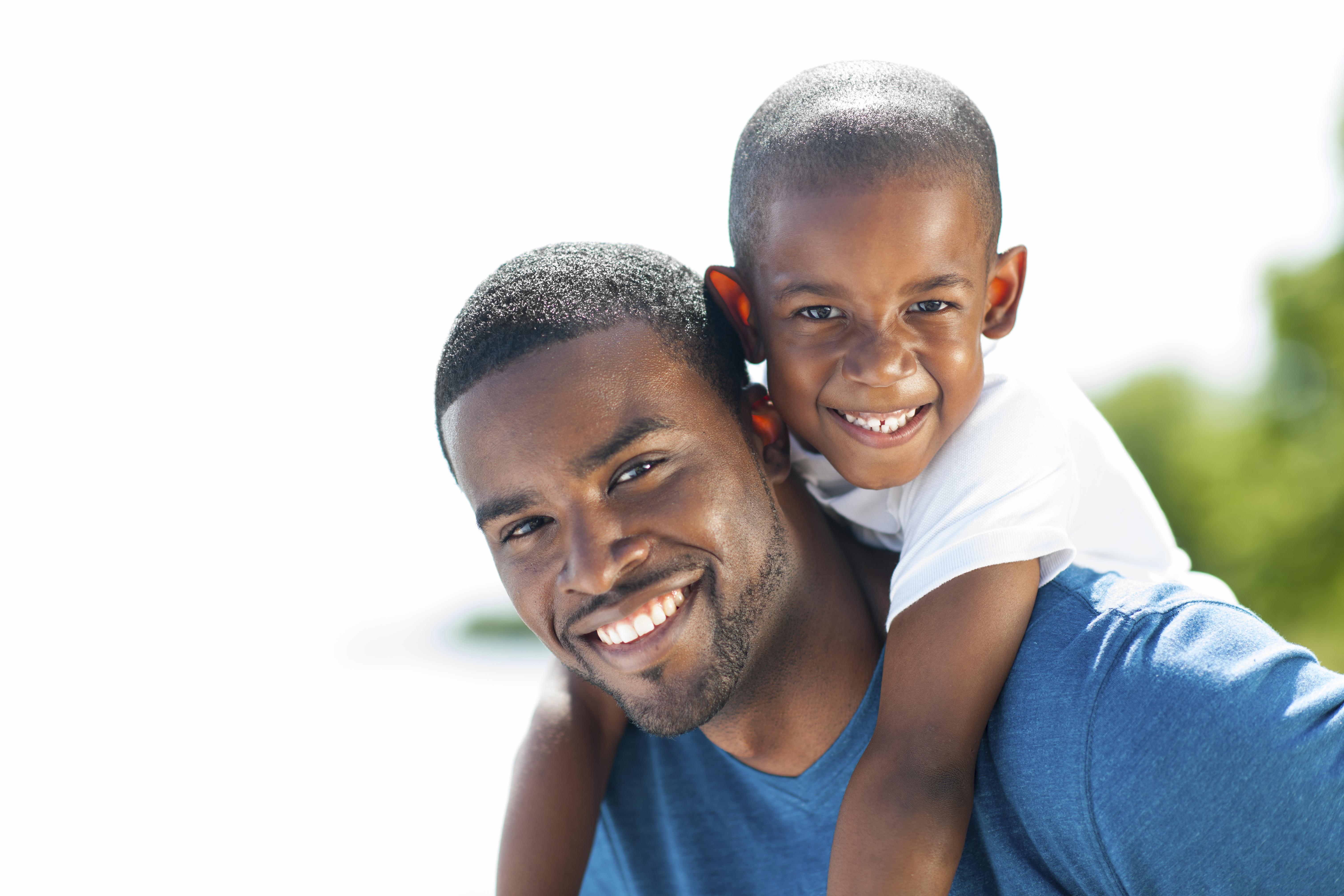 Father and son together at the park.