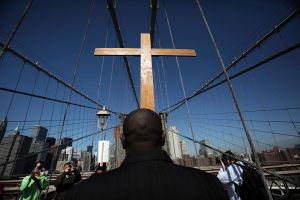Way Of The Cross Procession Crosses Over New York's Brooklyn Bridge