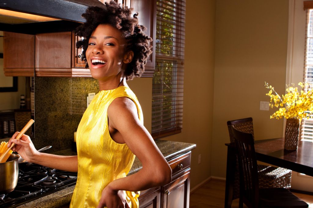 Beautiful woman cooking in the kitchen