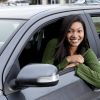 African American teenage girl driving car