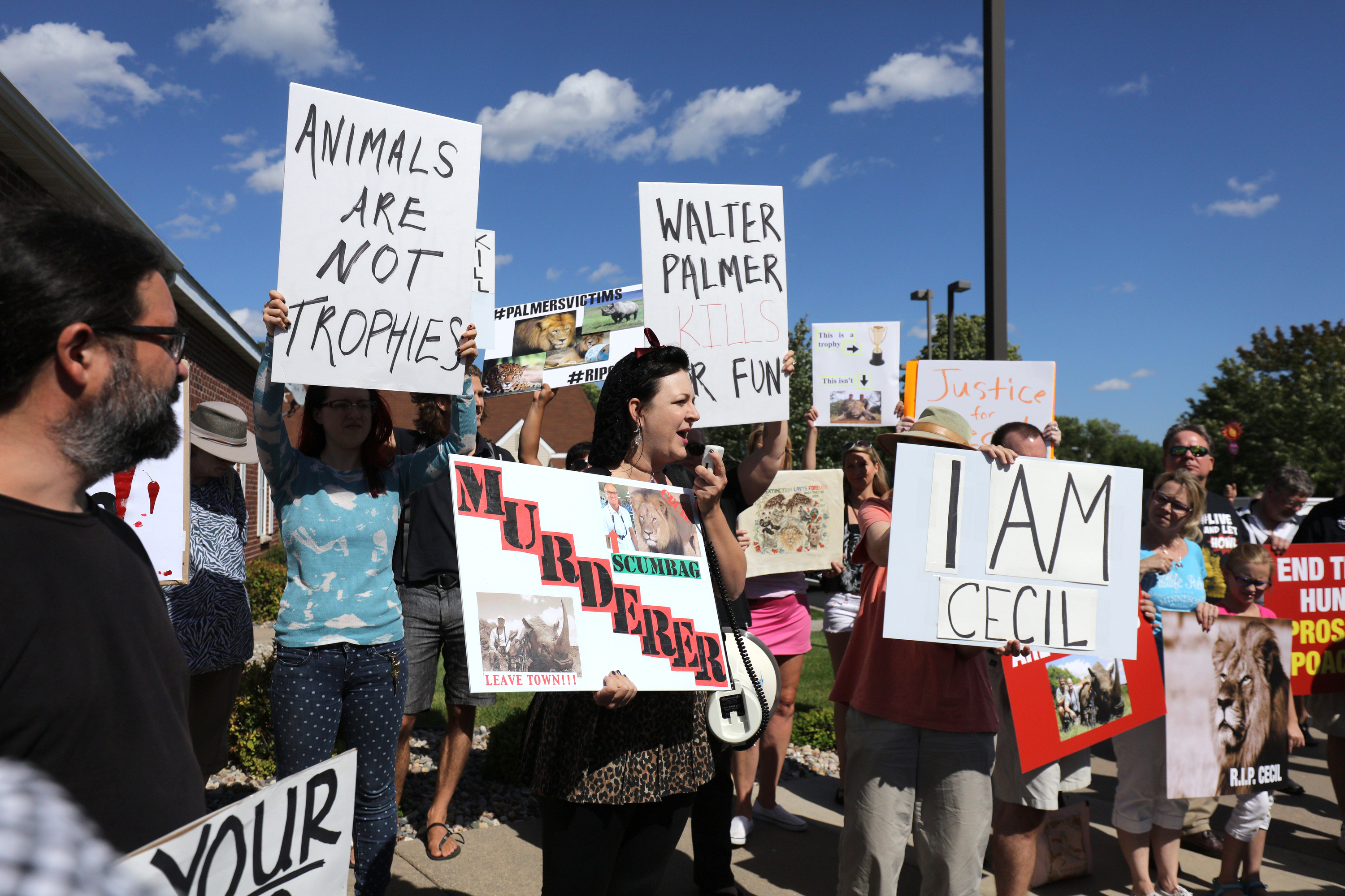 Memorial And Protest Held At Office Of Minnesota Dentist That Killed Famed Lion In Zimbabwe