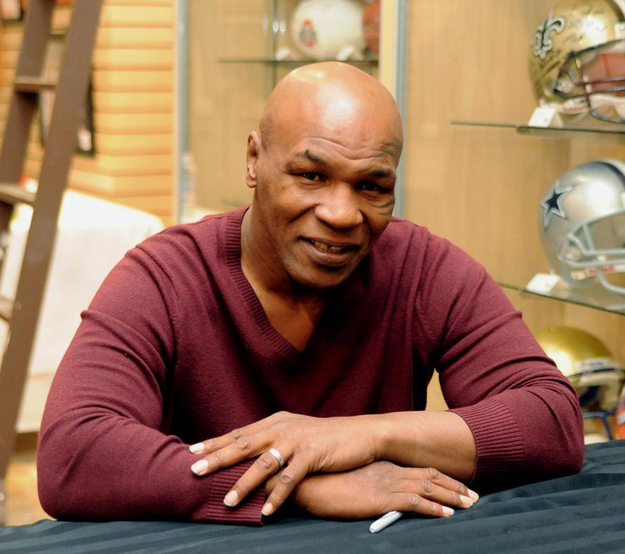 Tyson Signs Autographs In Las Vegas