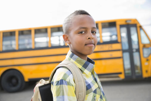 Child boarding school bus