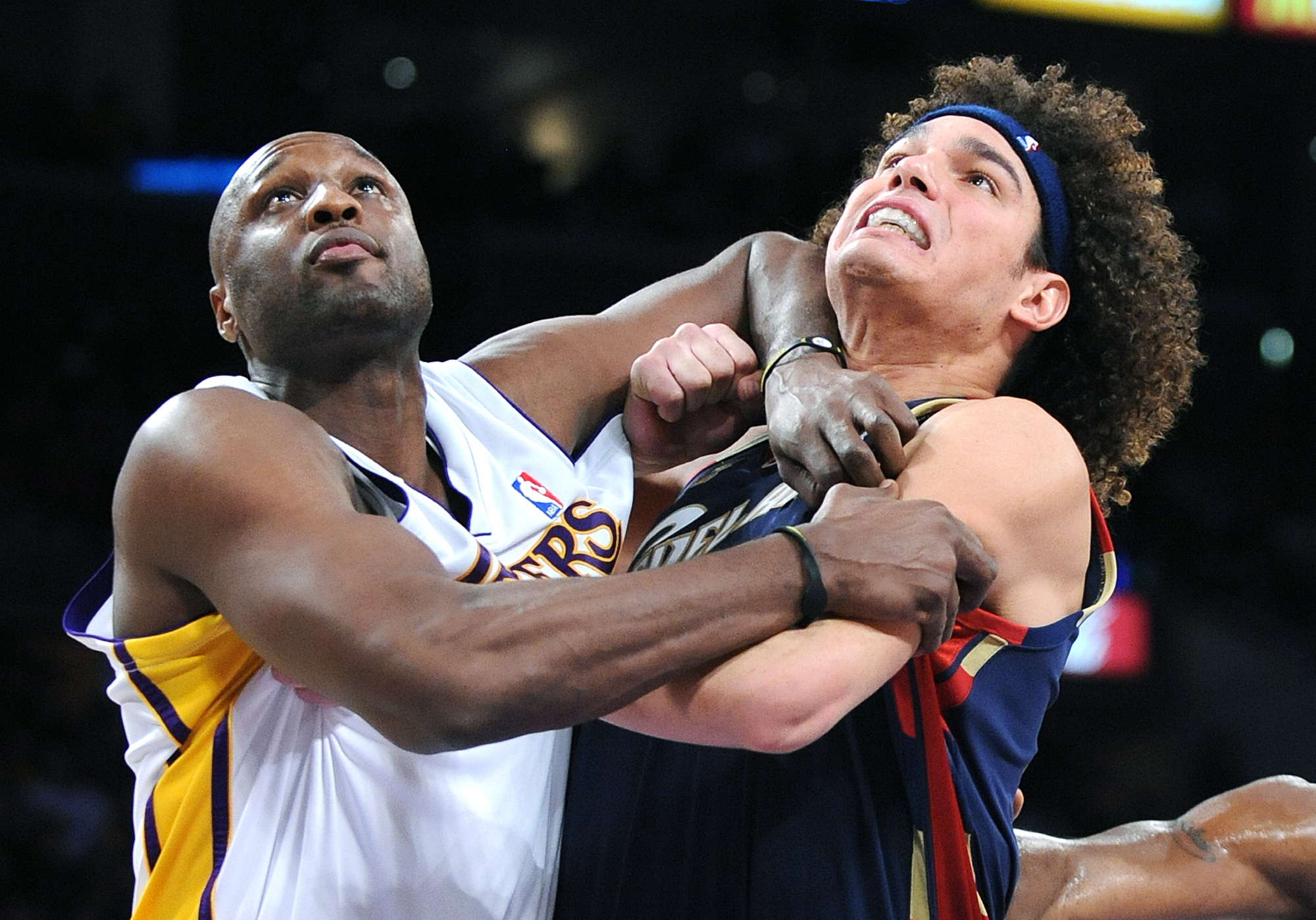 Lakers Lamar Odom grabs Cavaliers Anderson Varejo while batling for position under the basket at th