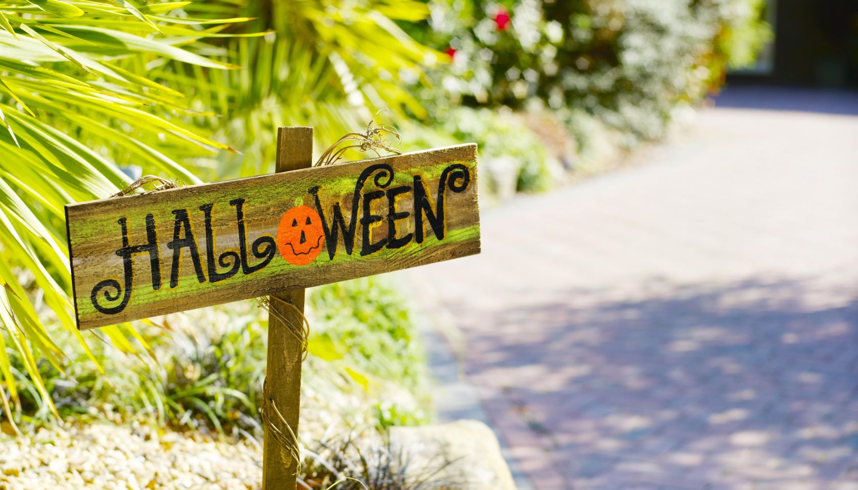 Halloween sign in driveway.