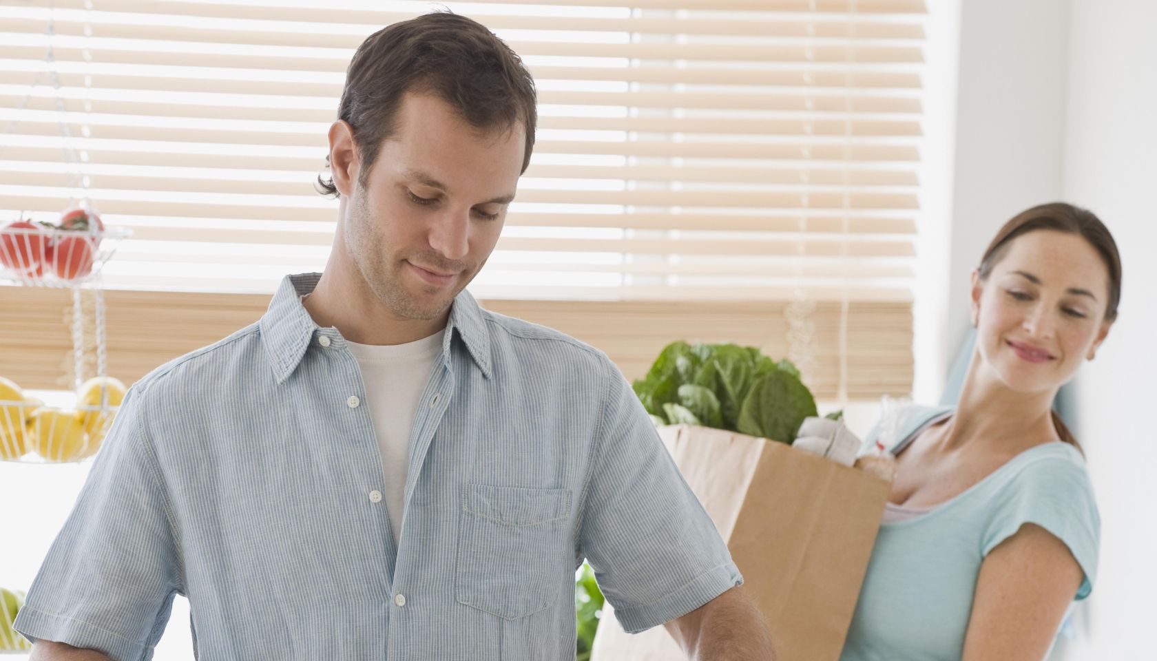 Hispanic couple preparing food