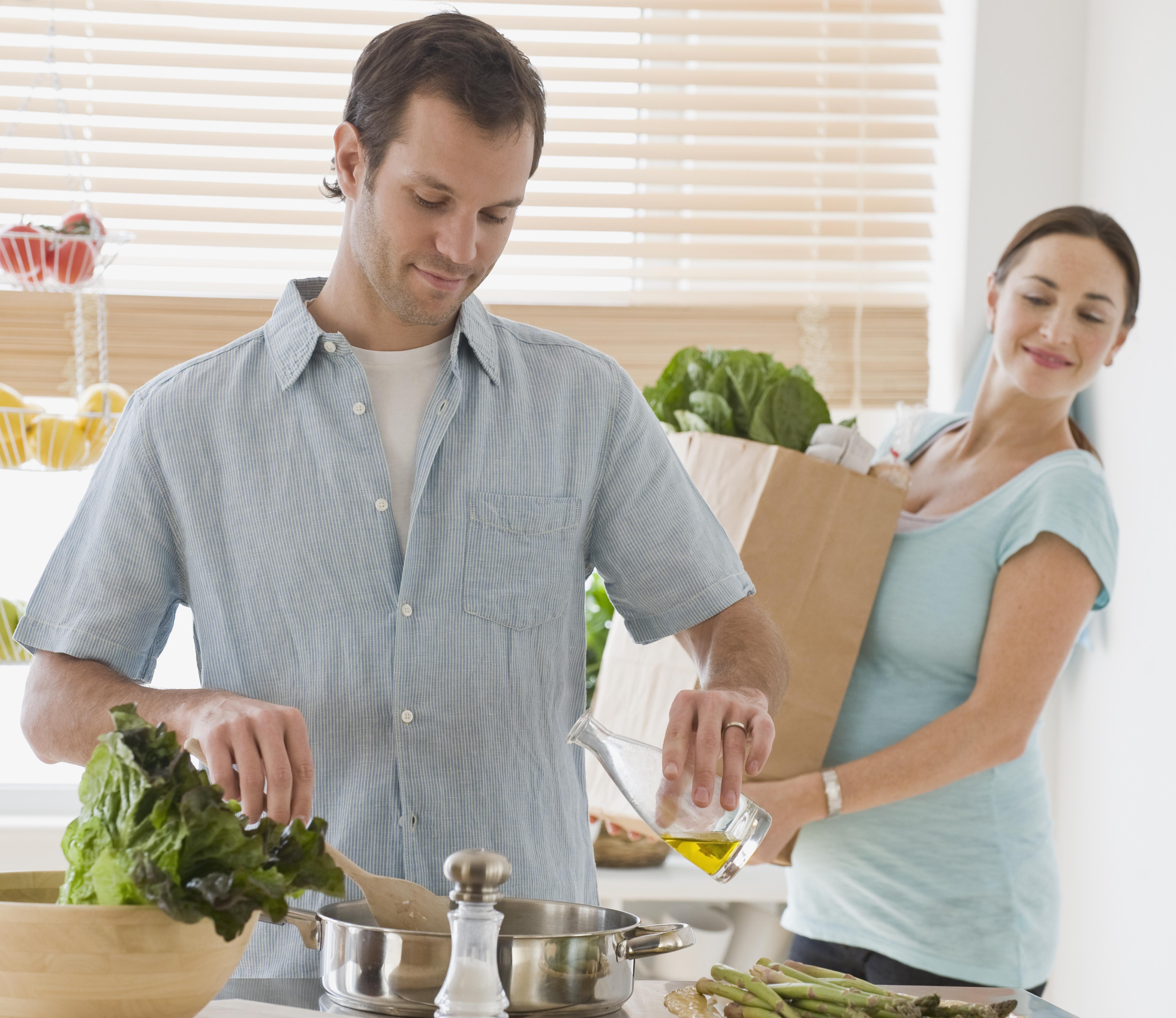 Hispanic couple preparing food