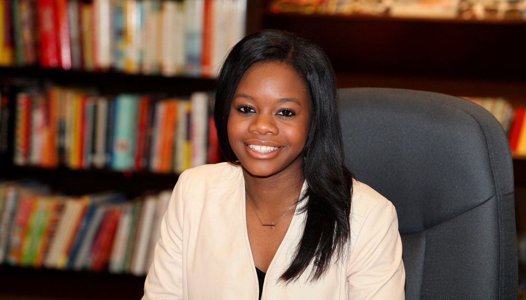 Gabby Douglas Book Signing For 'Raising The Bar' In Skokie, Illinois.