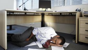 Mid Adult Man Sleeping Near Documents on Floor