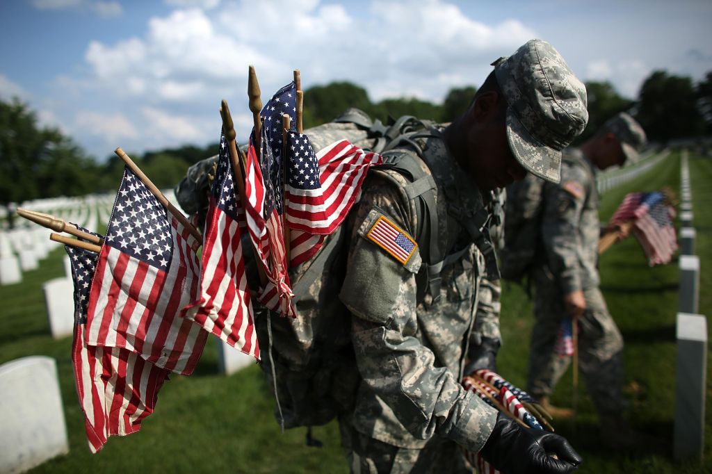 'Flags In' Ceremony Held At Arlington National Ahead Of Memorial Day