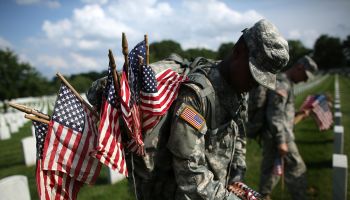 'Flags In' Ceremony Held At Arlington National Ahead Of Memorial Day