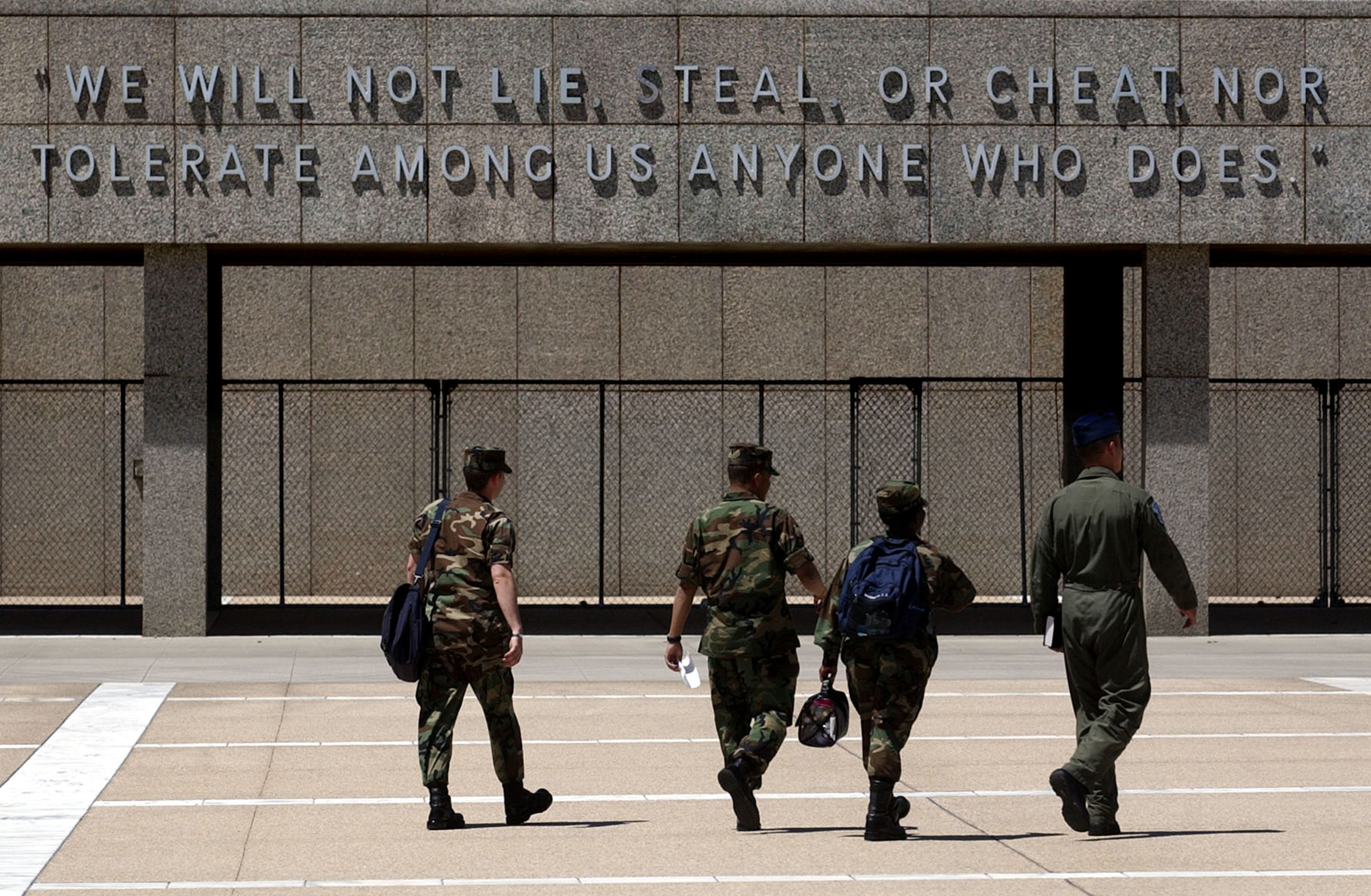 COLORADO SPRINGS,CO--MAY 7TH 2004--Air Force personal walk past the 'Wall of Honor,' located on the northwest end of the campus of the United States Air force Academy Friday afternoon. THE DENVER POST/ ANDY CROSS
