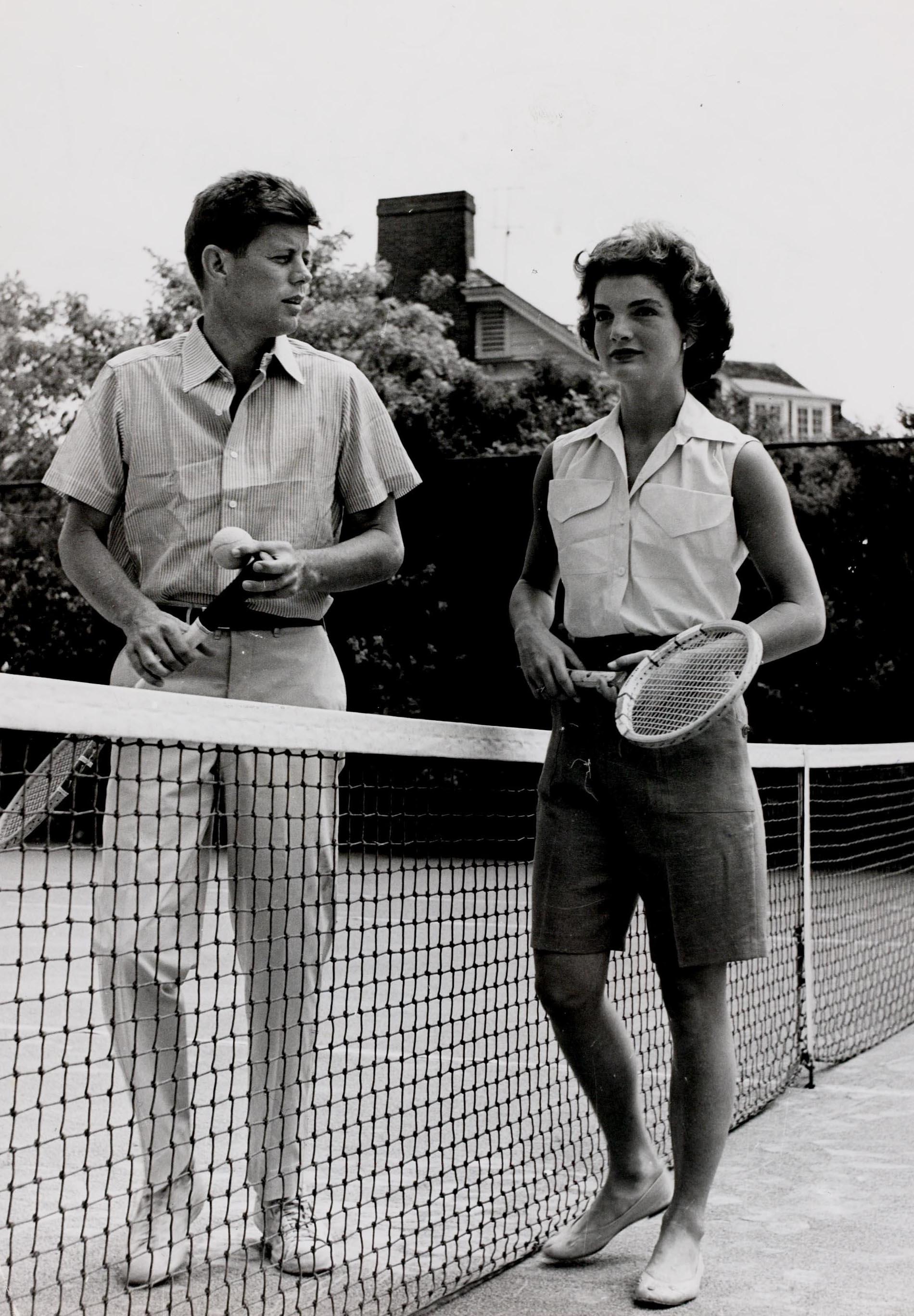 Popperfoto The Book. Volume 1. Page: 77. Picture:14. Circa 1953. A picture of John and Jacqueline Kennedy playing tennis. The couple were married in 1953, he going on to become President of the U.S.A. while she became a star in her own right.