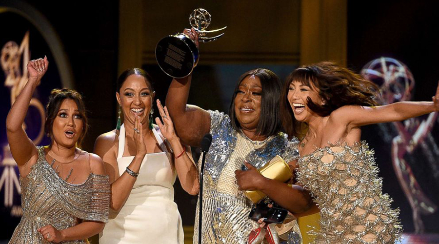  Adrienne Bailon, Tamera Mowry, Loni Love and Jeannie Mai, winners of Outstanding Entertainment Talk Show Host for âThe Realâ, onstage during the 45th annual Daytime Emmy Awards on April 29, 2018 in Pasadena, Calif. (Photo Credit: Getty) 