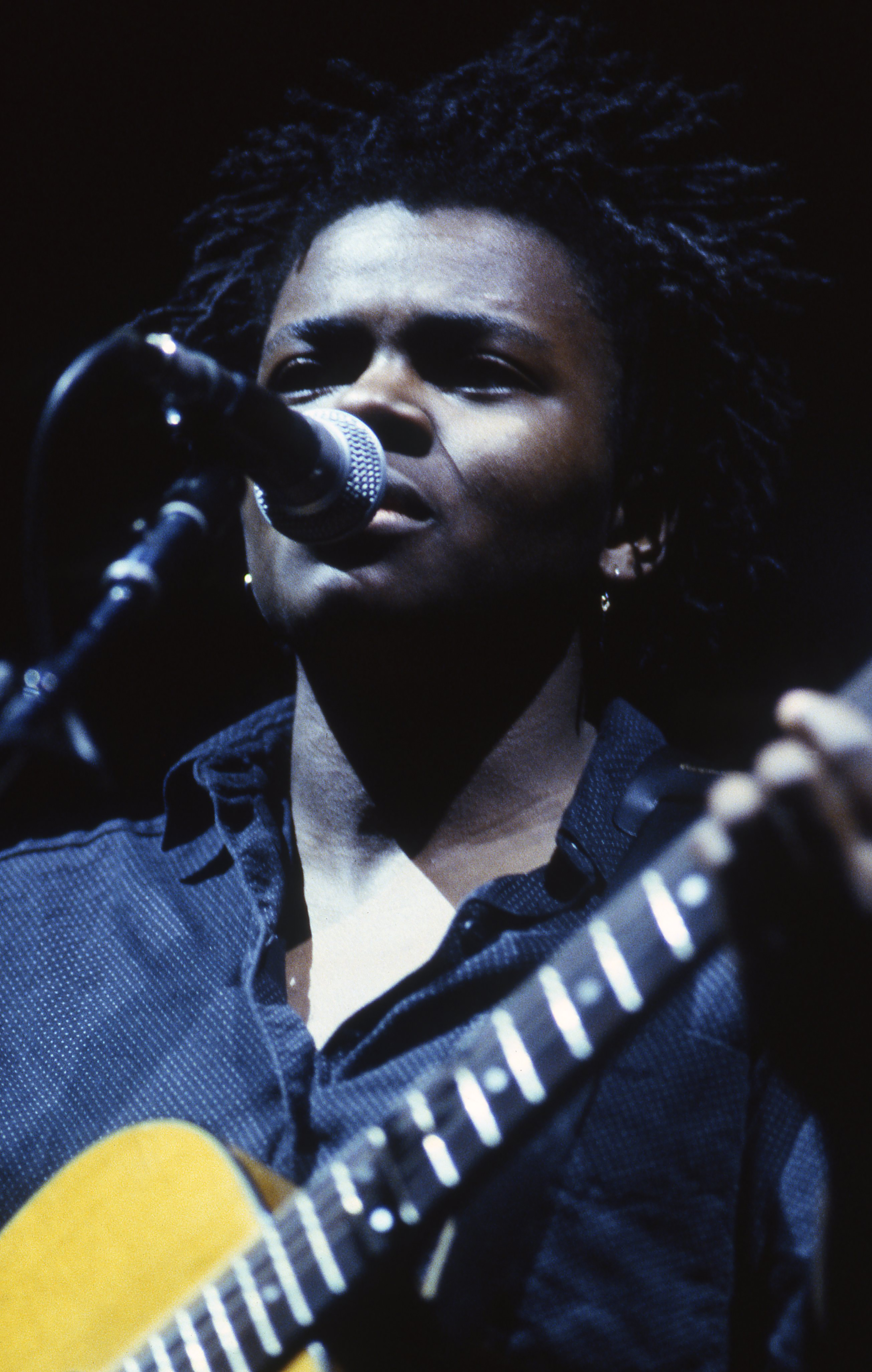 Tracy Chapman performs live at the Los Angeles Memorial Coliseum.