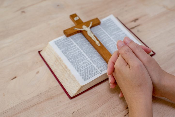 A man reading the Holy Bible.