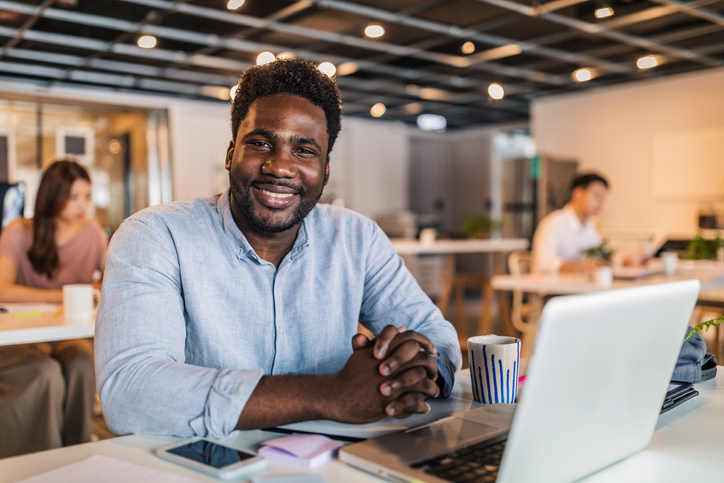 Handsome black gentleman in office