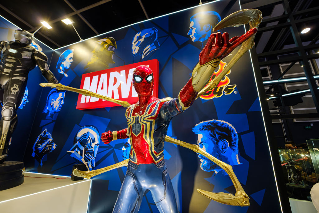 Marvel movie backdrop display with Spider-man replica at the...