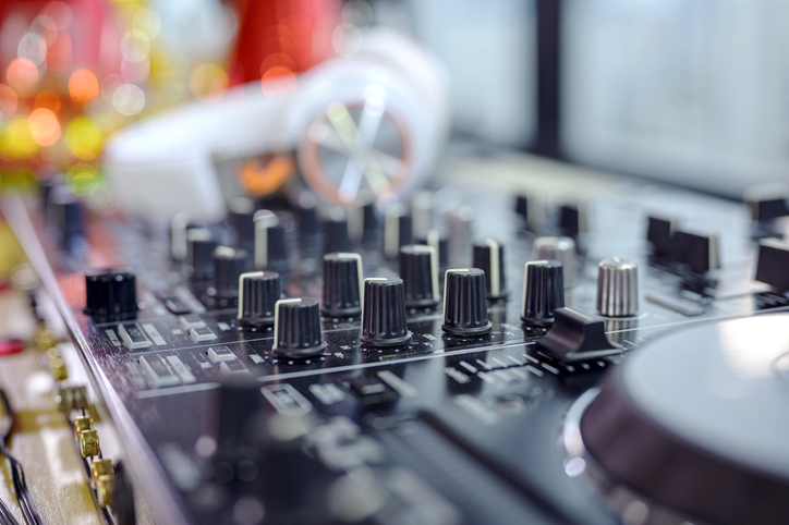 DJ mixer or sound equipment at nightclubs and music festivals.