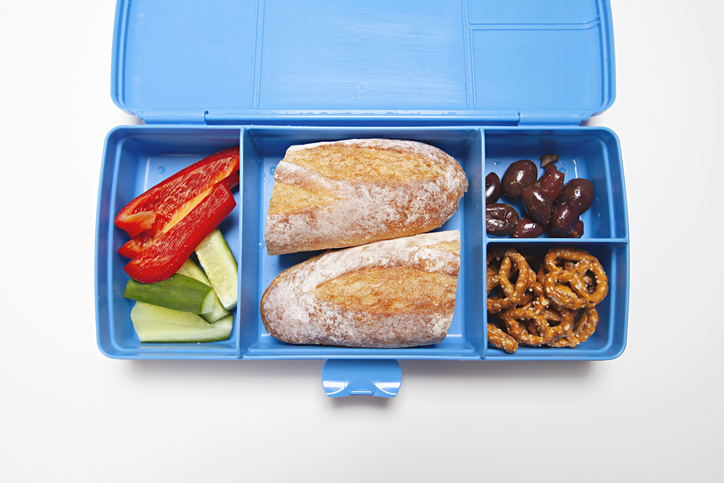 Healthy school or work lunch box with sandwich, vegetables and fruit in Australia