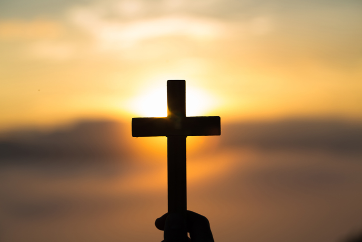 Silhouette Cross Against Sky During Sunset