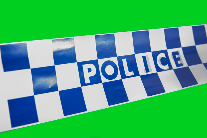 Australian Police Tape on a green screen background