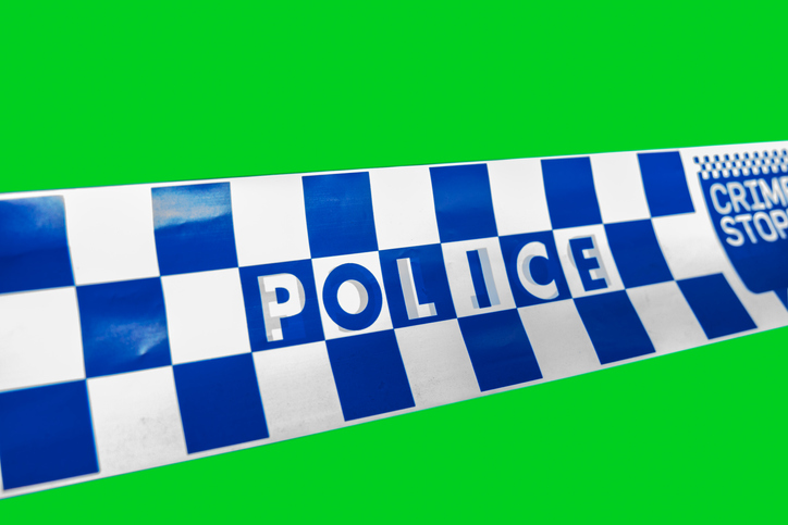 Australian Police Tape on a green screen background