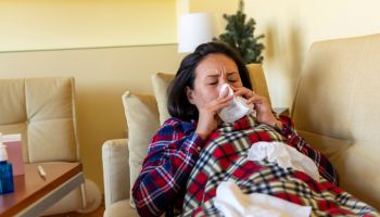 Ill Woman with the Flu at Home