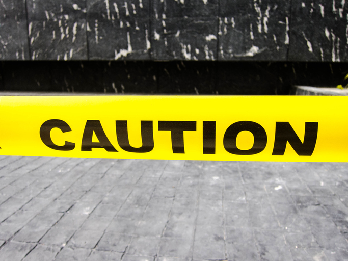Caution yellow tape sign outdoor