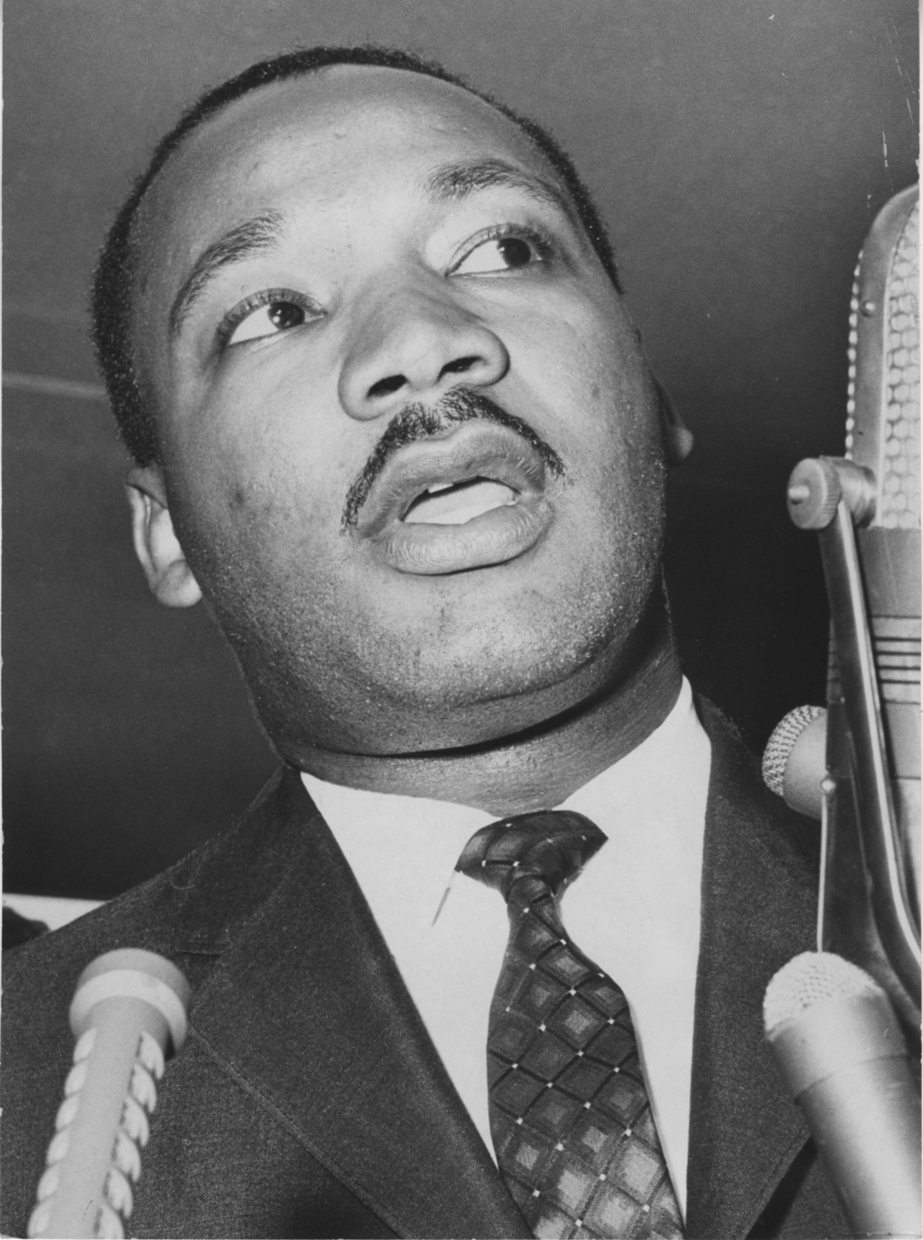 San Francisco, CA July 4, 1964 - Dr. Martin Luther King Jr. meets the press at San Francisco Airport.(Jim Edelen / Oakland Tribune)