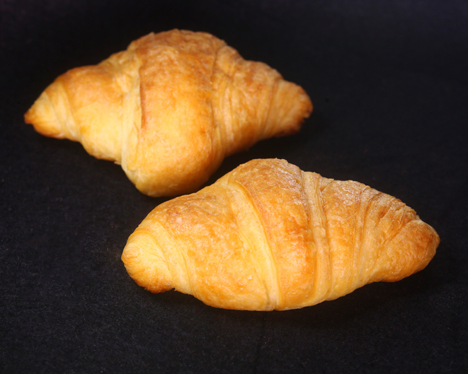 Croissant on black background