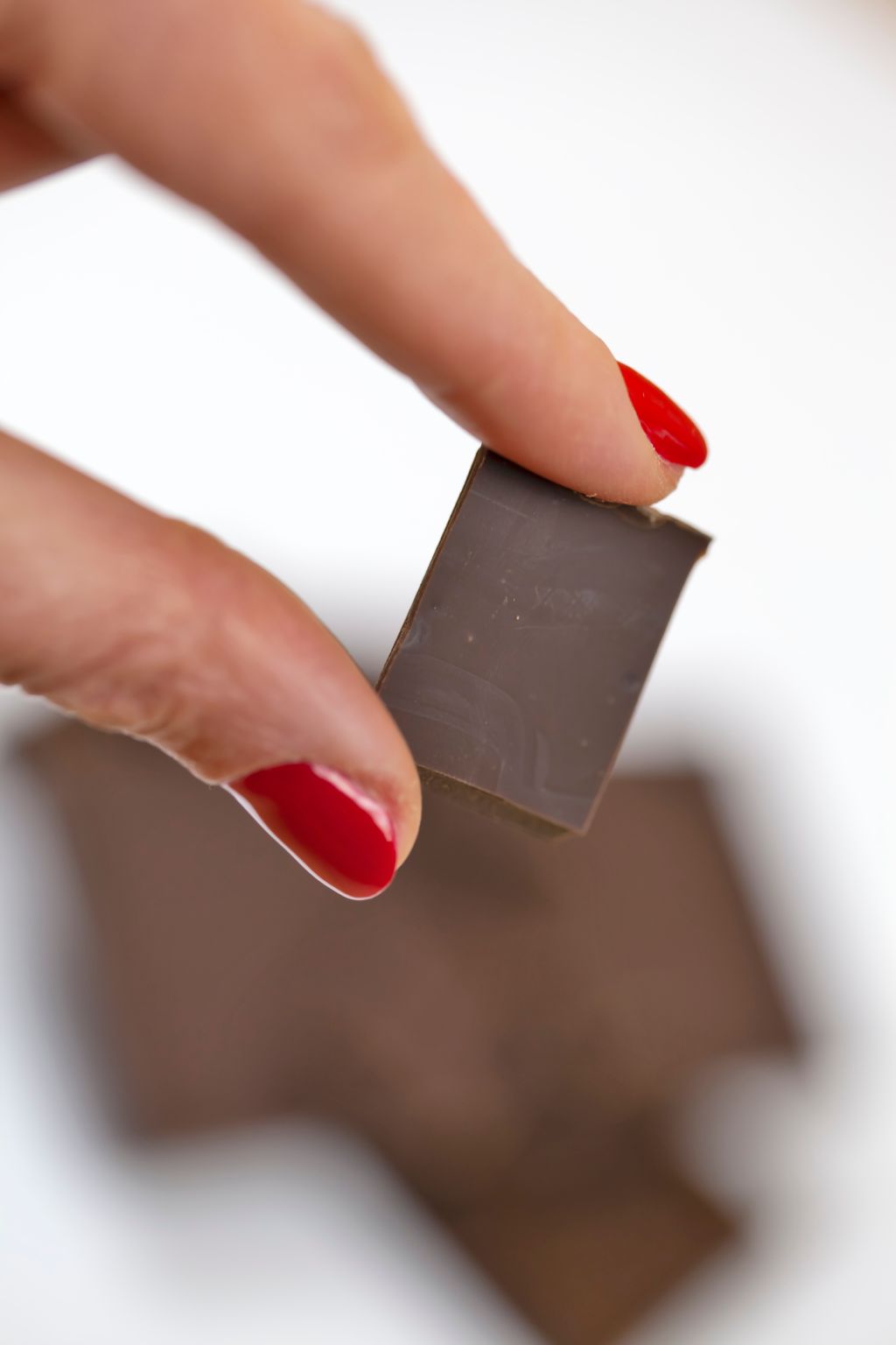 Woman holding chocolate chunks