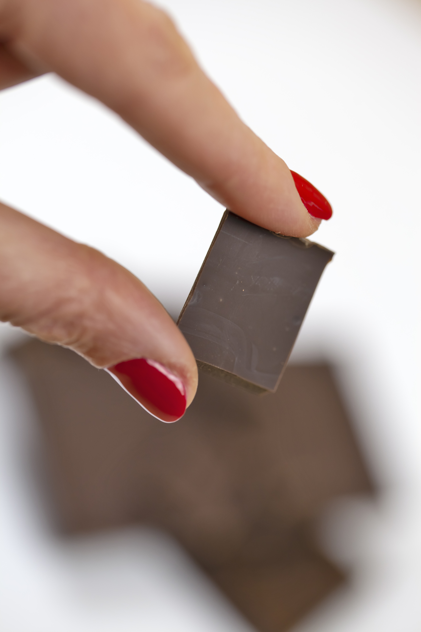 Woman holding chocolate chunks