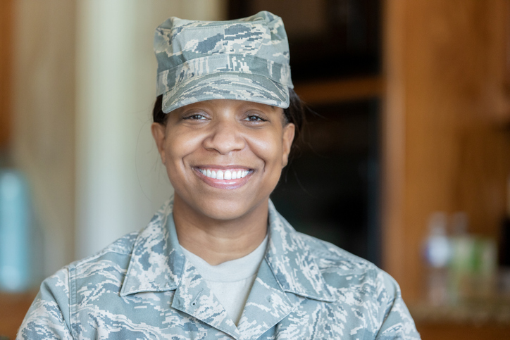 Adult woman wearing military uniform