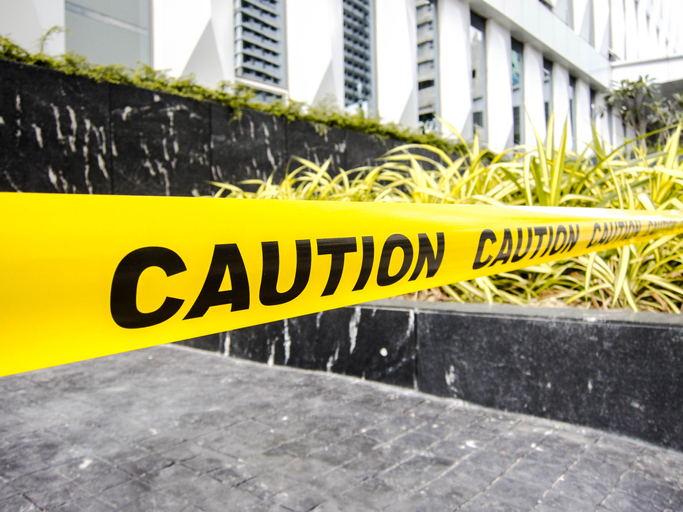 Caution yellow tape sign outdoor