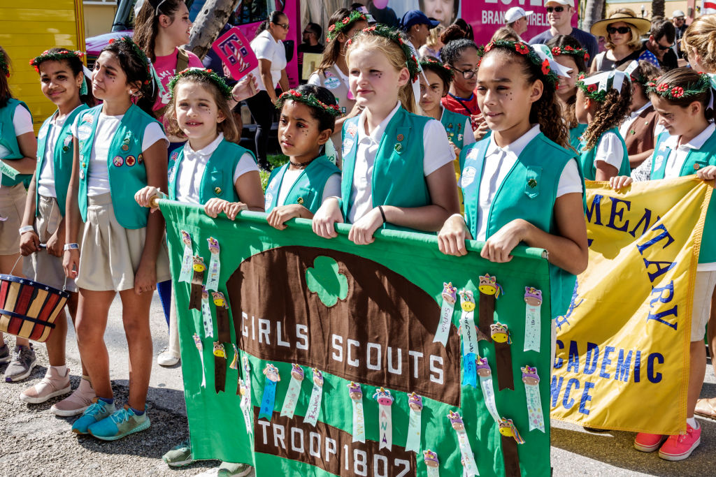 Miami Beach, Veterans Day Parade, Girl Scouts troop marching with banner