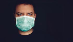 Man Wearing Medical Surgical Face Mask